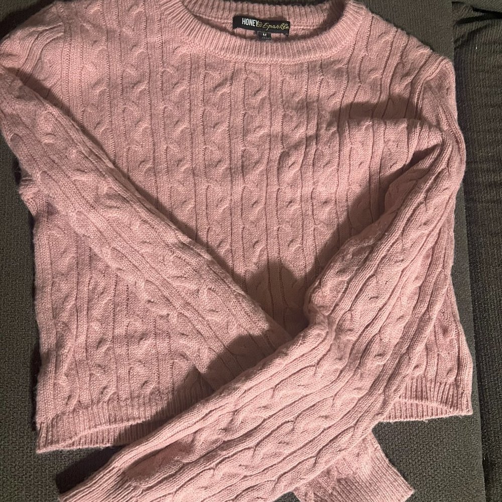 Cropped pink knit sweater